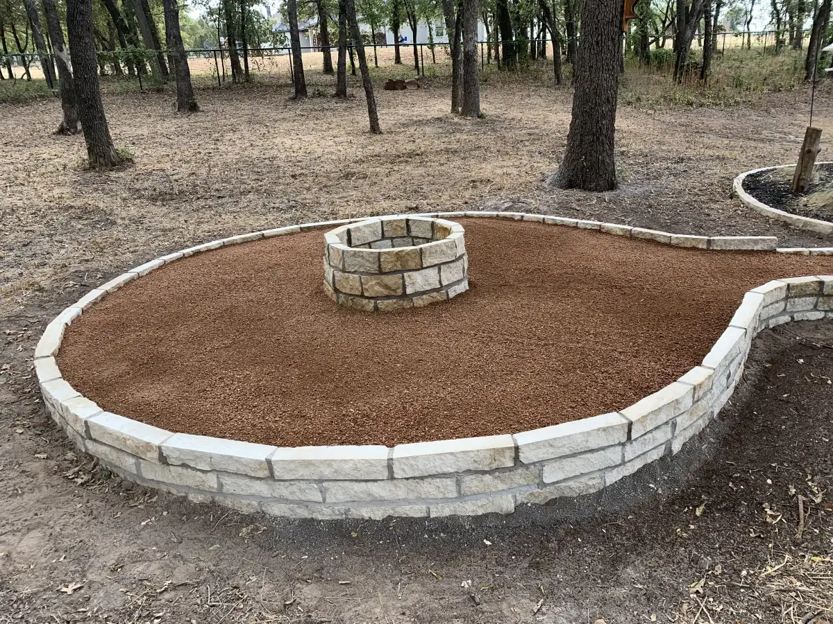 Stone patio with fire pit area at a Weatherford TX home